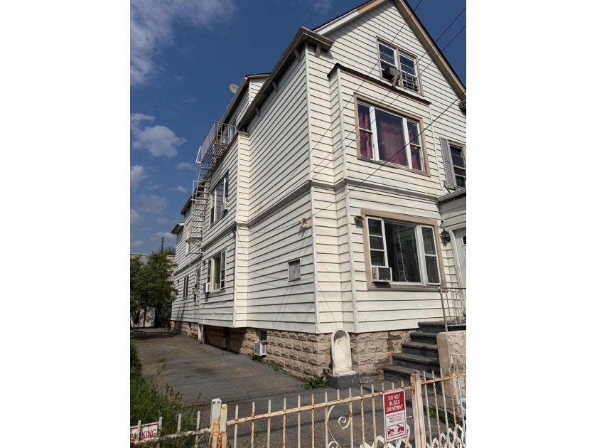 Investment Opportunity Reduced Price Legal 3-Family Detached 3BR - photo 3