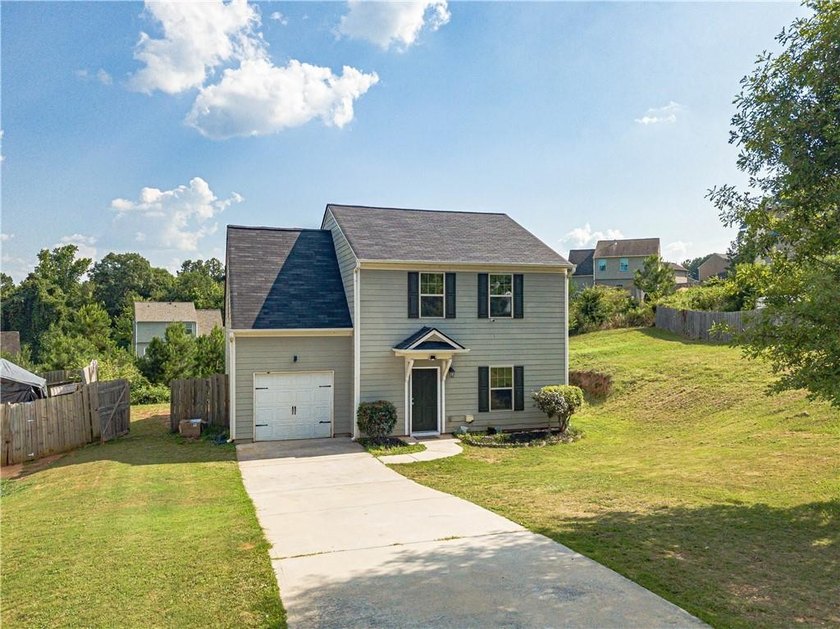 Welcome to this beautifully updated 4-bedroom, 2.5-bath home - photo 2