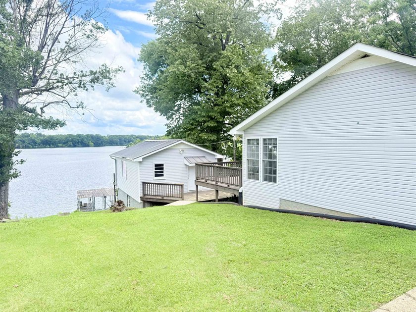 This waterfront home sits on Pickwick Lake. With 119 ft of - photo 33