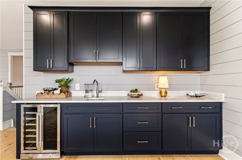 As the Model Home for The Isling, Lot 46 showcases the Wymberly - photo 45