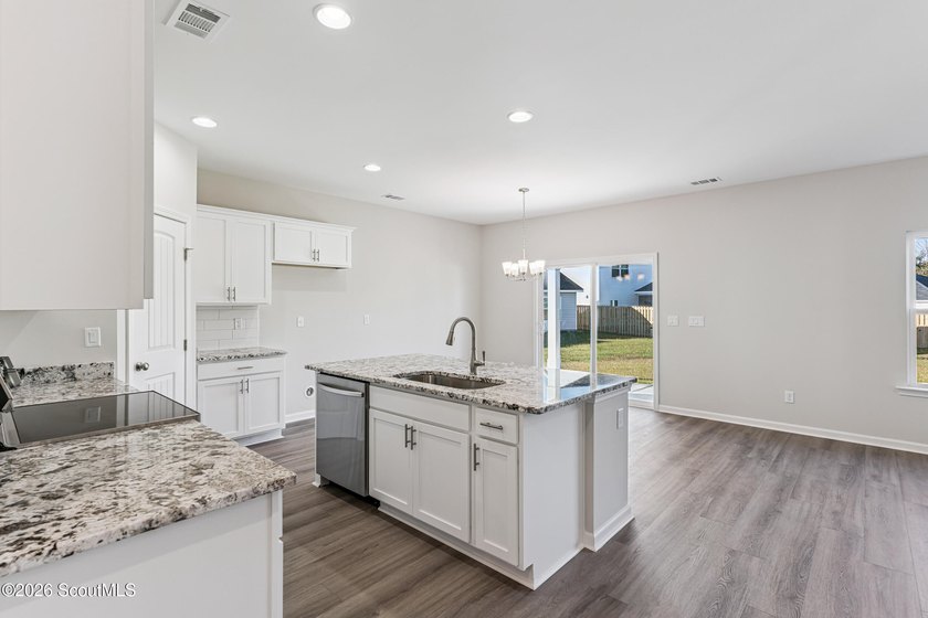 The Magnolia plan by Smith Family Homes is under construction in - photo 4