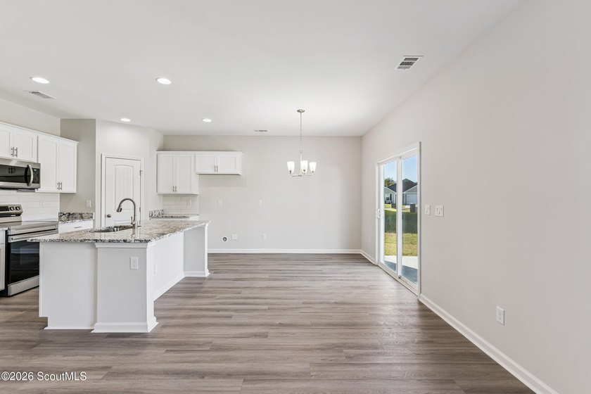 The Magnolia plan by Smith Family Homes is under construction in - photo 6