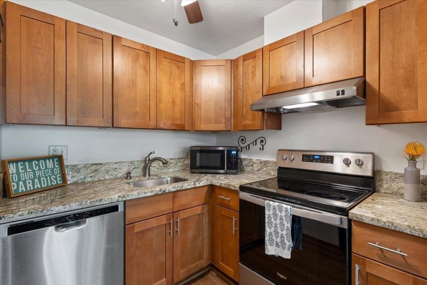 Kanoe Apts is a boutique 18-unit complex in sunny Kihei, with a - photo 11
