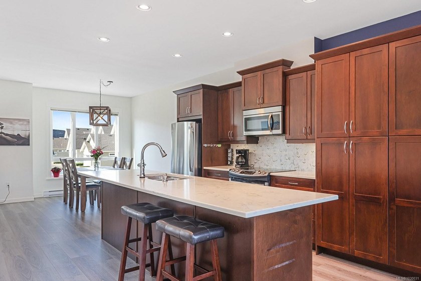 This three-story townhome is a fantastic opportunity to own in a - photo 13