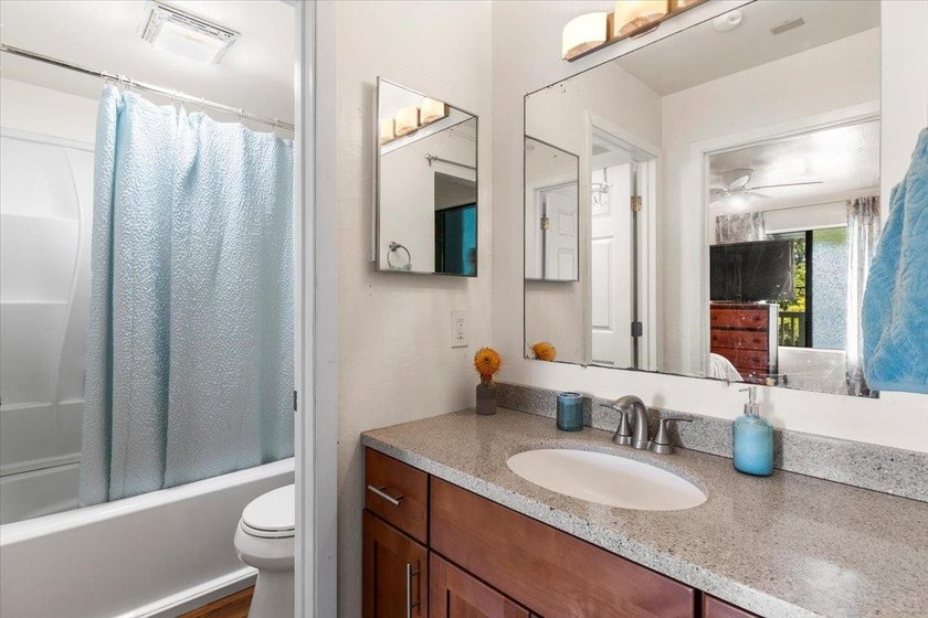 Kanoe Apts is a boutique 18-unit complex in sunny Kihei, with a - photo 17