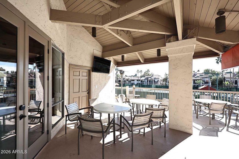 Ideal interior location with south facing patios on the big - photo 22