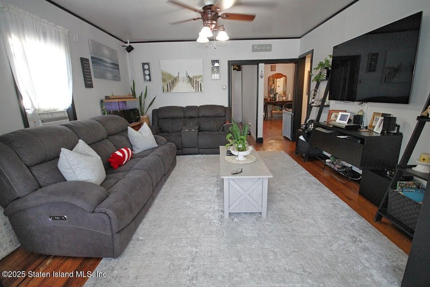 2 family 5/5 plus. Finished basement, large yard. Close to - photo 3