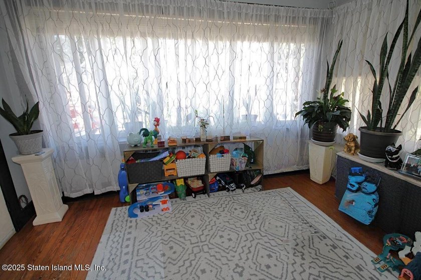 2 family 5/5 plus. Finished basement, large yard. Close to - photo 5