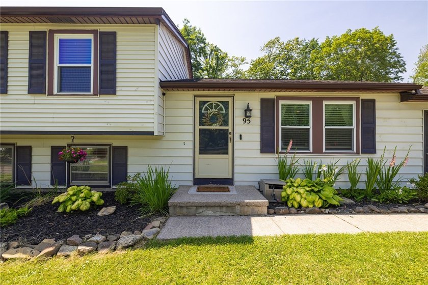 Welcome home to this beautifully updated split-level in the - photo 2