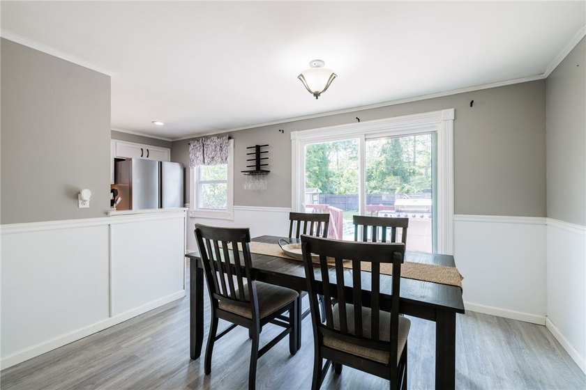Welcome home to this beautifully updated split-level in the - photo 7