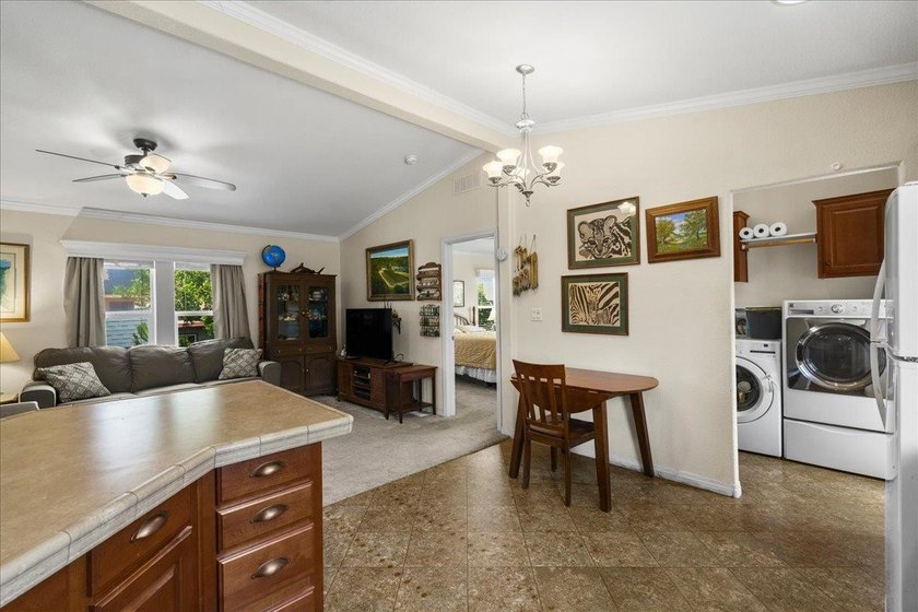 Welcome home to this charming 3-bedroom, 2-bath residence tucked - photo 12