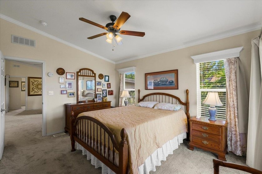 Welcome home to this charming 3-bedroom, 2-bath residence tucked - photo 15