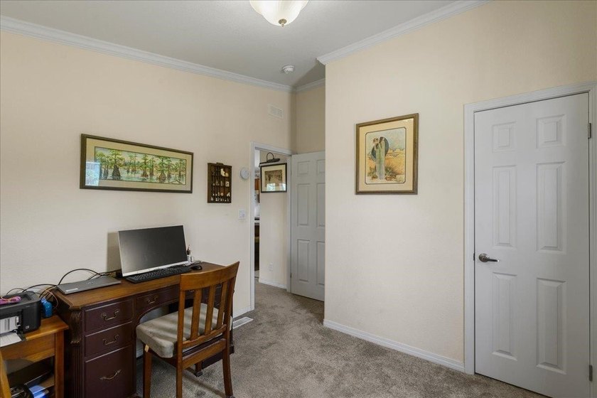 Welcome home to this charming 3-bedroom, 2-bath residence tucked - photo 30