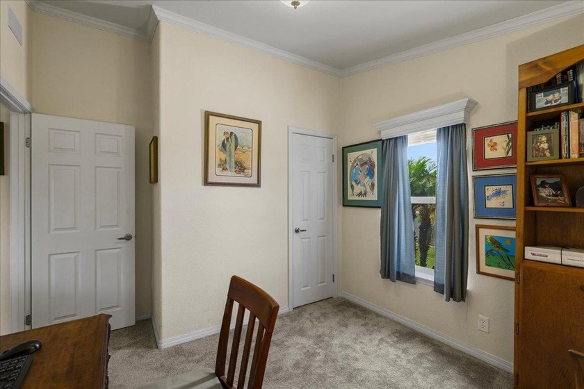 Welcome home to this charming 3-bedroom, 2-bath residence tucked - photo 31