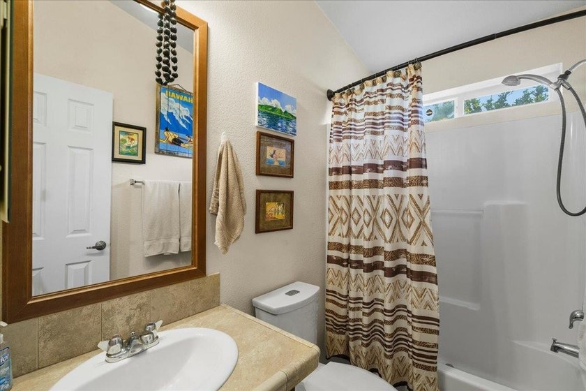Welcome home to this charming 3-bedroom, 2-bath residence tucked - photo 32