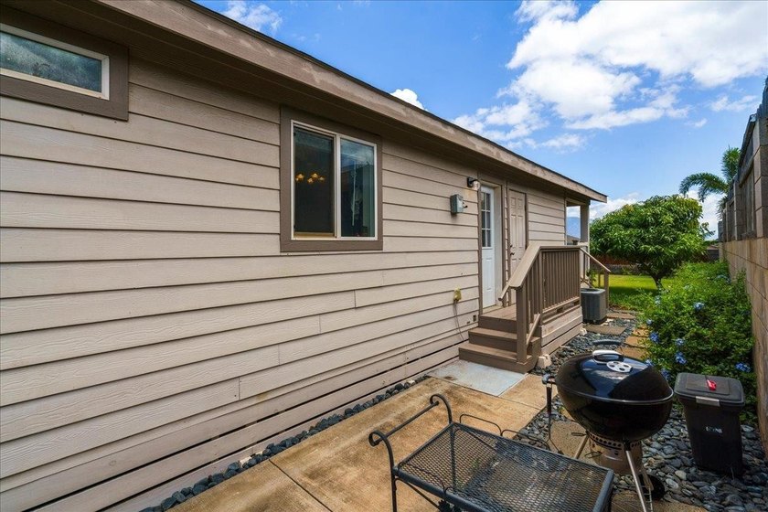 Welcome home to this charming 3-bedroom, 2-bath residence tucked - photo 34