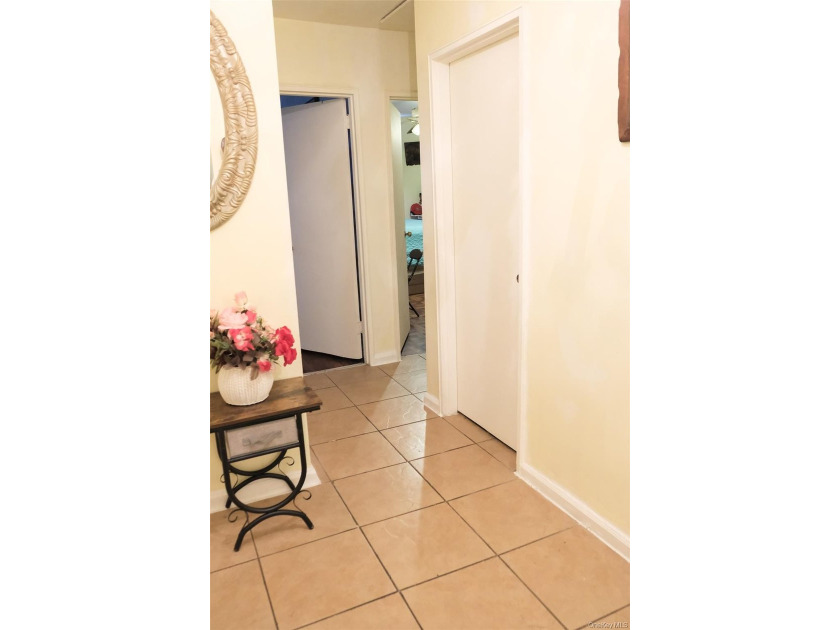 Welcome to this well-maintained two-family brick home located in - photo 6