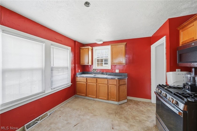 Welcome to 324 E 248th St in Euclid, a rare opportunity to own a - photo 7
