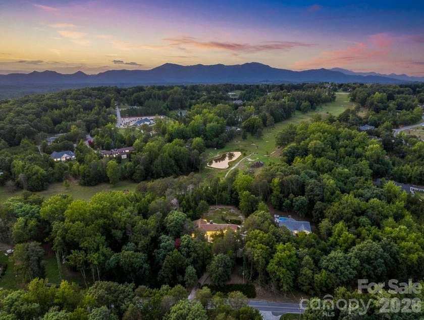 This newly renovated brick ranch home is hidden and secluded - photo 2