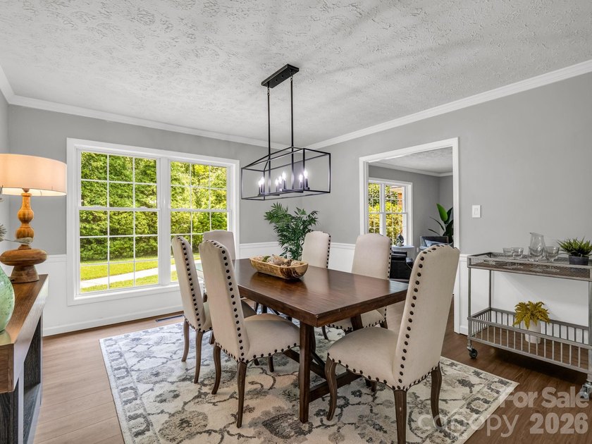 This newly renovated brick ranch home is hidden and secluded - photo 8