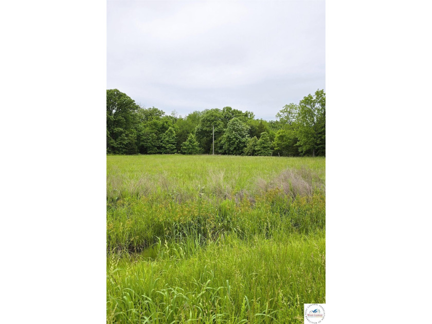 Beautiful 5.50-acre lot with gently rolling hills, a mix of open - photo 2