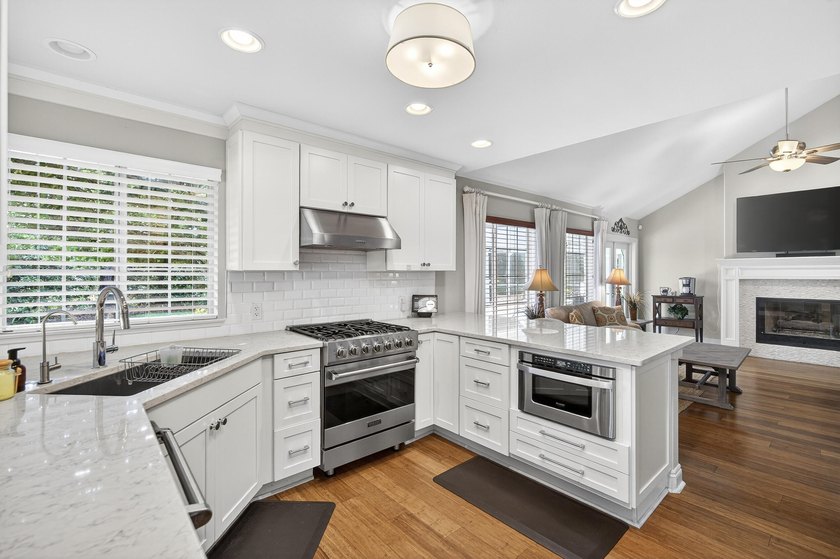 This stunning home is truly the jewel of the neighborhood--don't - photo 2