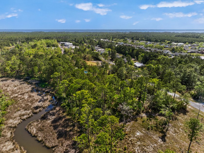 Discover the perfect blend of privacy, space, and waterfront - photo 4