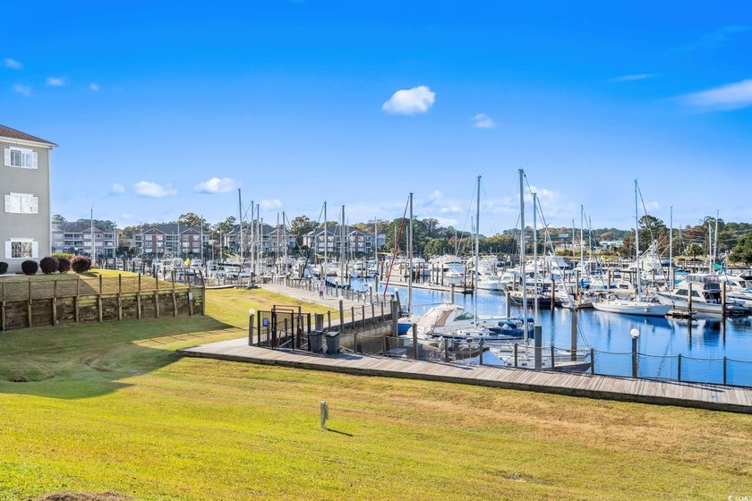 Located in desirable Harbourfront Villas, this fully furnished - photo 5