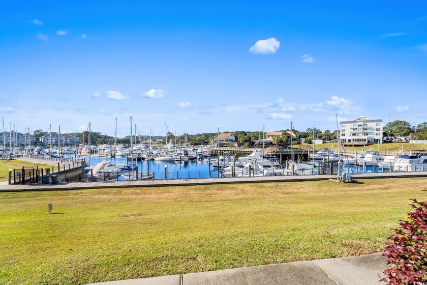 Located in desirable Harbourfront Villas, this fully furnished - photo 6