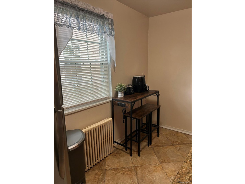 Must see !!!!!This spacious first floor unit located in the - photo 4