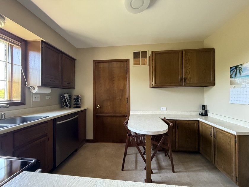Welcome to this beautifully maintained second-floor condo in the - photo 8
