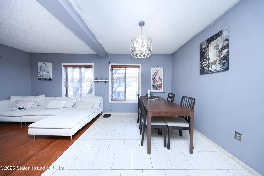BEAUTIFUL AND METICULOUSLY MAINTAINED ONE FAMILY END UNIT - photo 8