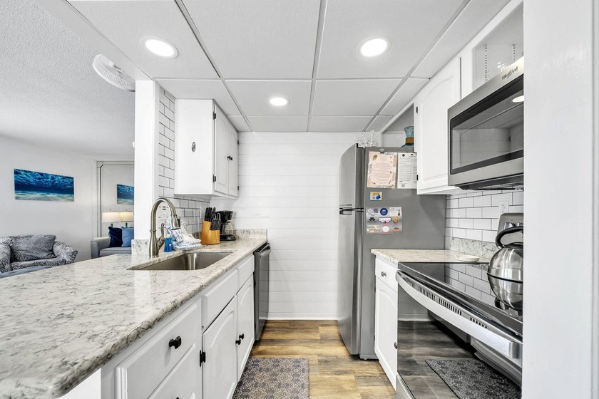 Sandpiper Cove 1013 is a beautifully updated coastal retreat - photo 7