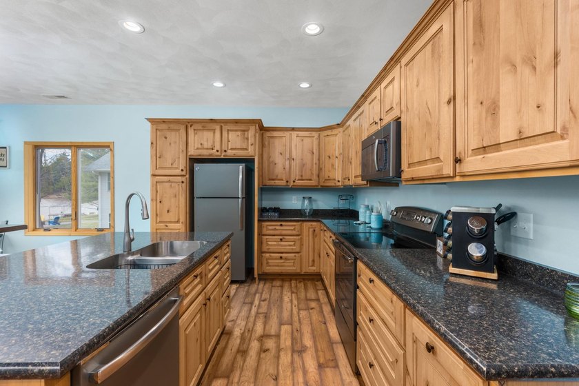 Live your best lake life at this stunning turnkey waterfront - photo 17