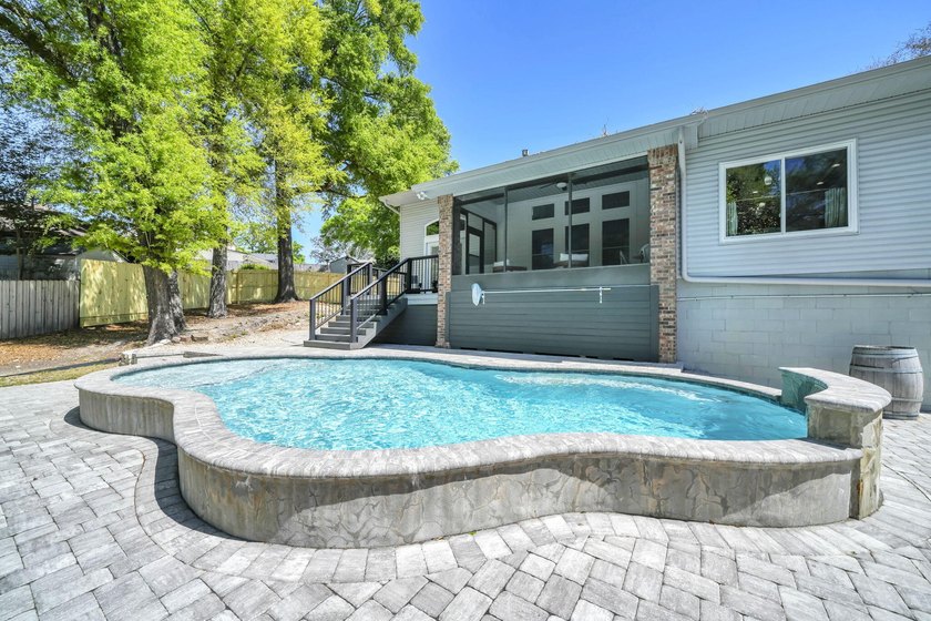 $ 19,100 PRICE IMPROVEMENT ! BREATHTAKING, POOL home tucked in a - photo 2