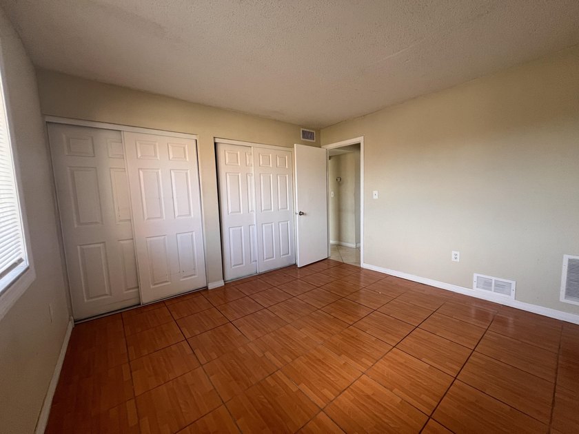 FOR SALE-Second floor condo 2 bedroom 1 bath. AC and Water - photo 10