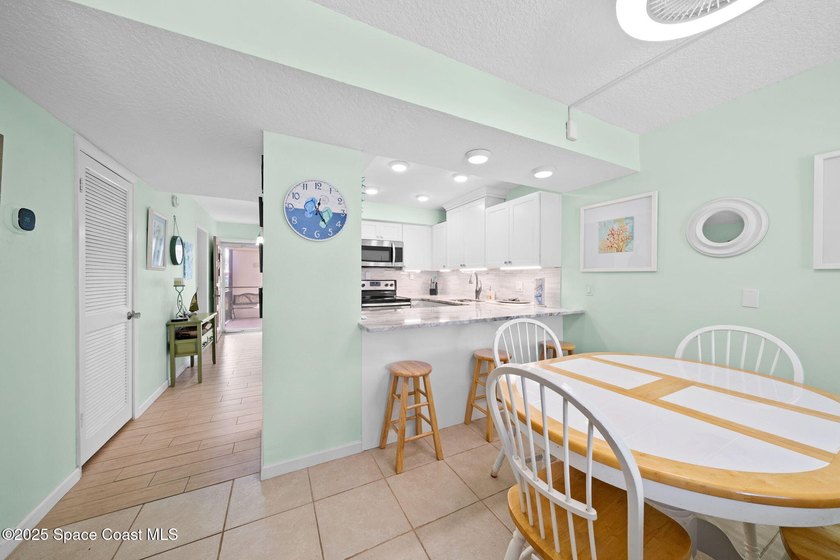 Live the coastal dream in this beautifully updated ground floor - photo 11
