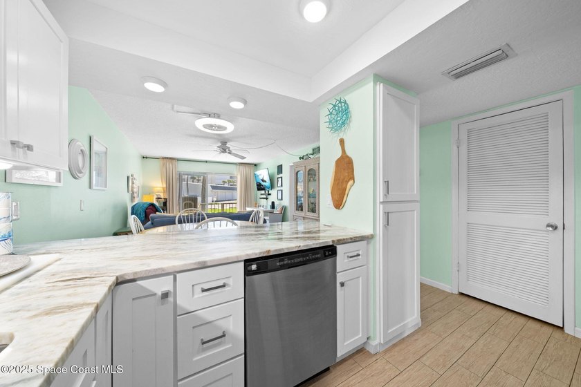 Live the coastal dream in this beautifully updated ground floor - photo 13