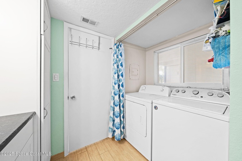 Live the coastal dream in this beautifully updated ground floor - photo 23