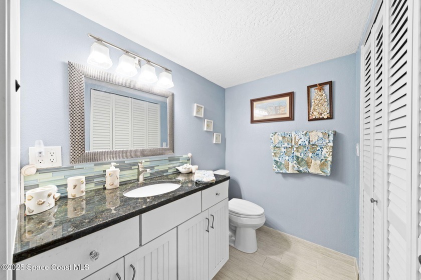 Live the coastal dream in this beautifully updated ground floor - photo 27