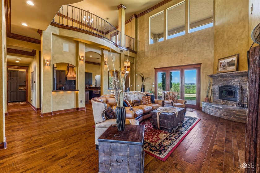 Perched above the tranquil waters of Lake Nasworthy just outside - photo 10