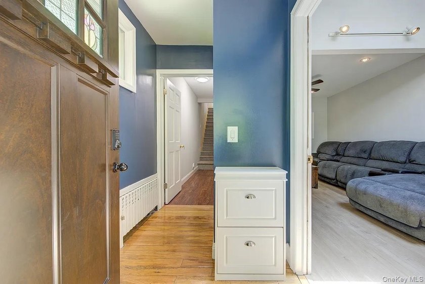 Welcome to 90-10 69th Avenue - a private, detached 2-family home - photo 3
