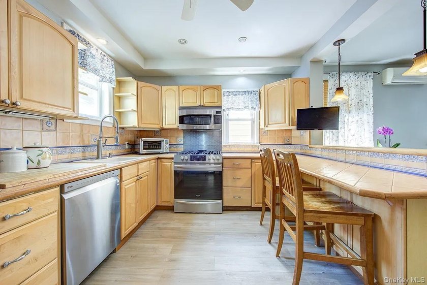 Welcome to 90-10 69th Avenue - a private, detached 2-family home - photo 10