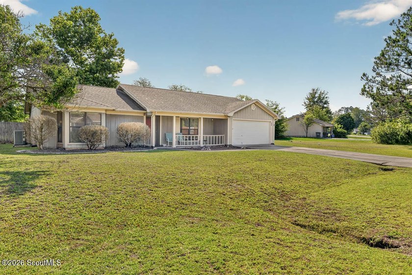 Welcome home to this charming 3-bedroom, 2-bath residence in the - photo 3