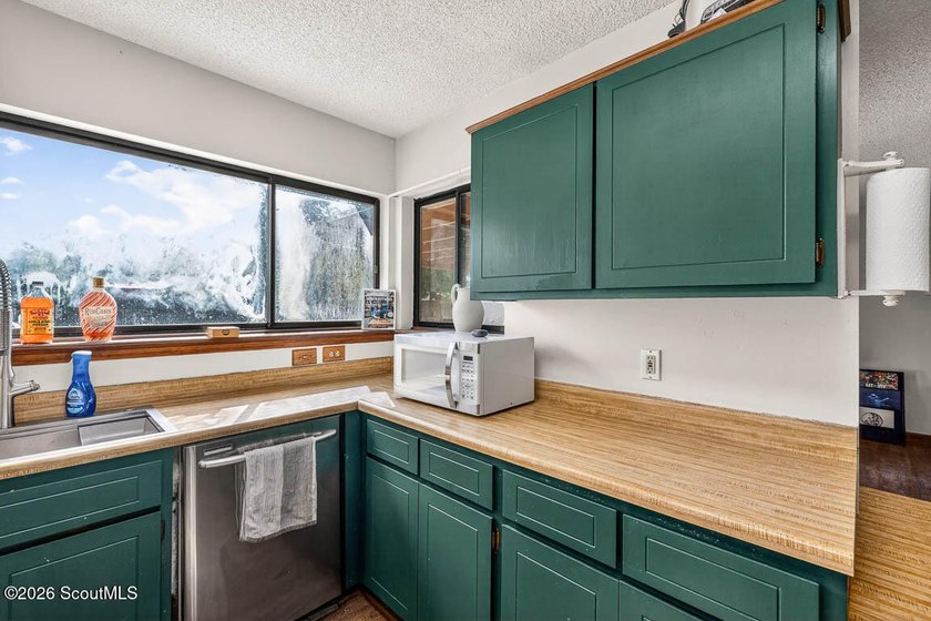 Welcome home to this charming 3-bedroom, 2-bath residence in the - photo 9