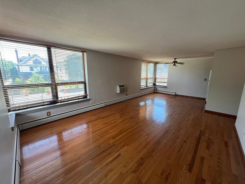 2BR/2BA corner-unit condo in the Whittier neighborhood! This - photo 2