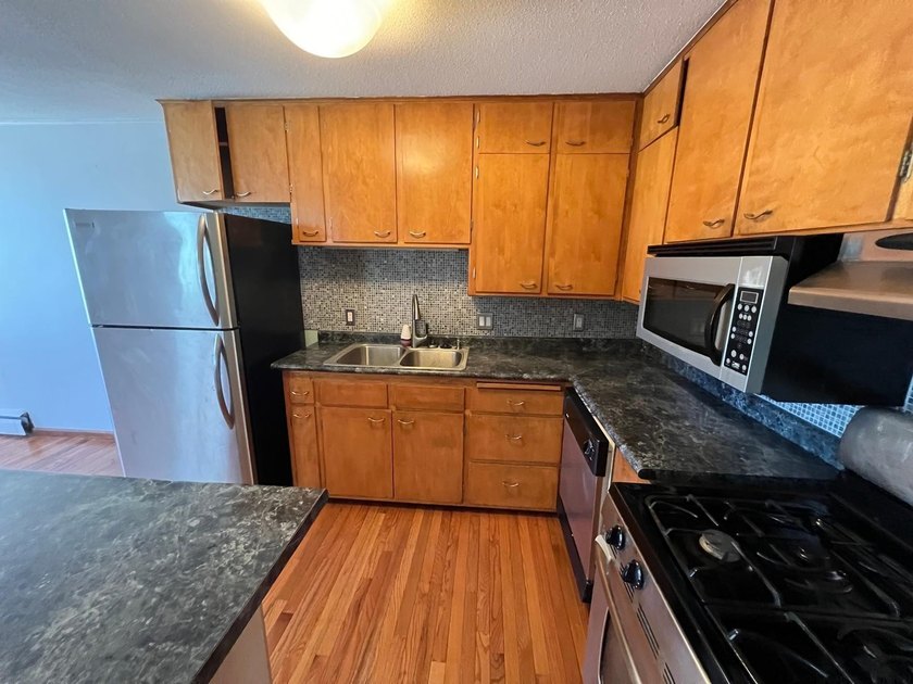 2BR/2BA corner-unit condo in the Whittier neighborhood! This - photo 6