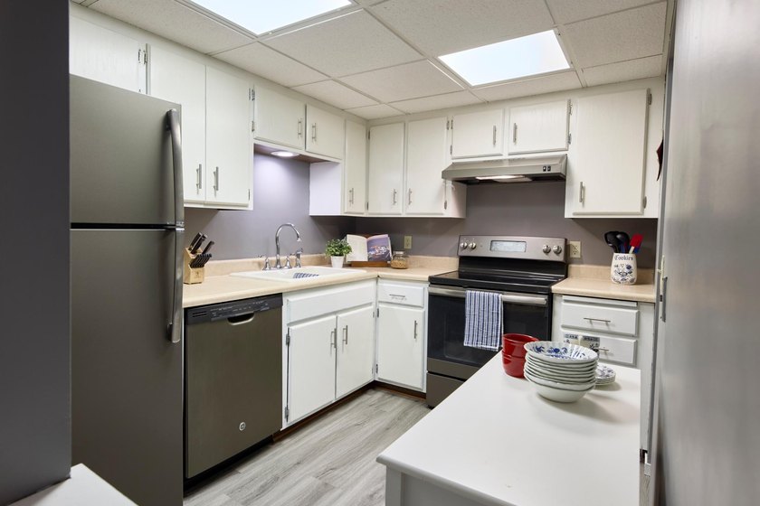 OWN for LESS than Rent! Top-floor living at Lochmoor! Enjoy the - photo 13