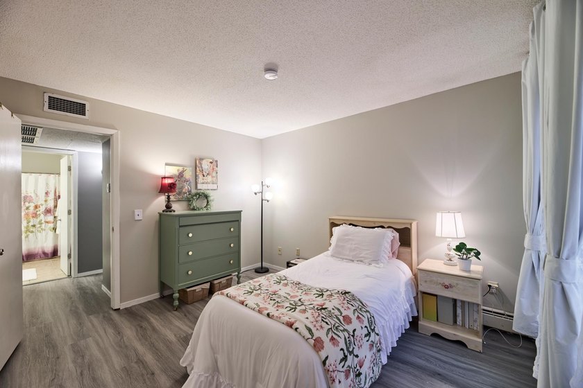 OWN for LESS than Rent! Top-floor living at Lochmoor! Enjoy the - photo 17