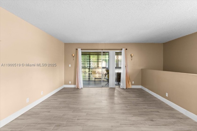 Welcome to this beautifully upgraded corner unit condo in the - photo 8